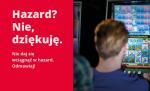 z lewej na czerwonym tle napis hazard? nie, dziękuję, z prawe siedzący tyłem mężczyzna