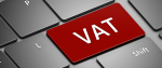 Fragment klawiatury z czerwonym klawiszem z napisem VAT